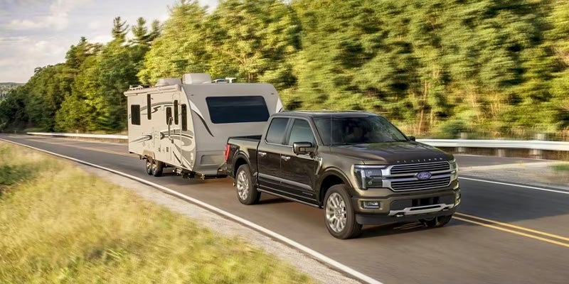 2024 Ford F-150 towing a moving house